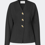 The Doritmd Blazer is a feminine tailored blazer with a clean collarless neckline and a fitted silhouette. Sculptural gold-tone buttons add a refined statement, while the shaped panels accentuate the waist for a flattering fit. Wear it with the matching trousers or layer it over a dress for a modern, sophisticated look.