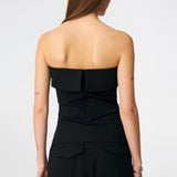 The Doritmd Top is an elegant strapless top with a fitted silhouette and a distinctive fold-over neckline for a modern, sophisticated look. Shaped seams create a flattering fit, while the concealed back zip ensures a clean finish. Pair it with the matching Doritmd Pants or a skirt for everything from elevated everyday dressing to evening occasions.