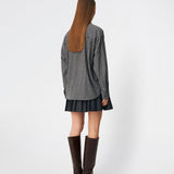 Classic shirt with a timeless checked pattern. Dorotheamd shirt is designed in a relaxed, slightly oversized silhouette with a classic collar, button-front closure, and a chest pocket. Long sleeves with buttoned cuffs complete the laid-back look. A versatile wardrobe staple that can be worn buttoned up with jeans or styled open over a T-shirt or tank top.