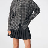 Classic shirt with a timeless checked pattern. Dorotheamd shirt is designed in a relaxed, slightly oversized silhouette with a classic collar, button-front closure, and a chest pocket. Long sleeves with buttoned cuffs complete the laid-back look. A versatile wardrobe staple that can be worn buttoned up with jeans or styled open over a T-shirt or tank top.