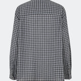 Classic shirt with a timeless checked pattern. Dorotheamd shirt is designed in a relaxed, slightly oversized silhouette with a classic collar, button-front closure, and a chest pocket. Long sleeves with buttoned cuffs complete the laid-back look. A versatile wardrobe staple that can be worn buttoned up with jeans or styled open over a T-shirt or tank top.