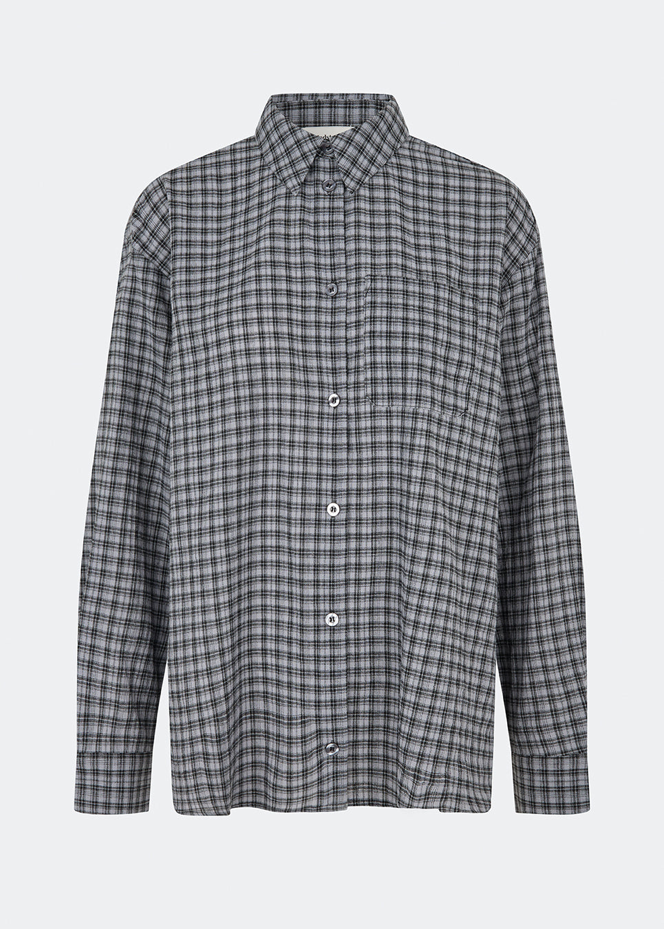 Classic shirt with a timeless checked pattern. Dorotheamd shirt is designed in a relaxed, slightly oversized silhouette with a classic collar, button-front closure, and a chest pocket. Long sleeves with buttoned cuffs complete the laid-back look. A versatile wardrobe staple that can be worn buttoned up with jeans or styled open over a T-shirt or tank top.