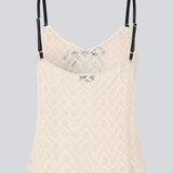 Cute Loose top is in light beige/white soft lace material. EmiliaMD lace top has small adjustable black straps and a black bow detail in front.