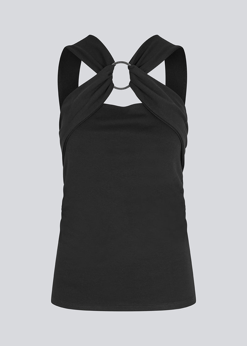 Fitted black top in an elastic material. EmiliaMD top has a detailed metal ring at the chest and wide straps.