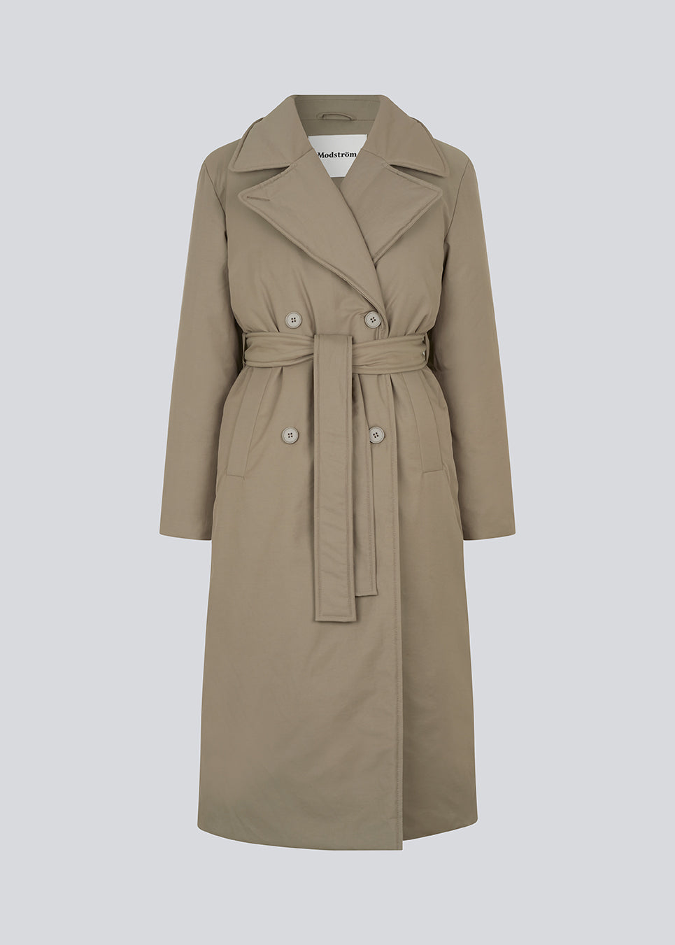 Jacket in a trench coat look with outer layer made from a cotton and nylon blend. EsmeMD jacket is double-breasted with a wide collar and lapel along with a wide tie belt at the waist. The model is 175 cm and wears a size S/36.