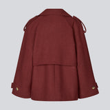 Cropped double-breasted wool coat in burgundy/dark red with hidden buttons. EsmundMD jacket has classic coat details with raglan sleeves and a high yoke at the back. Lined.&nbsp;