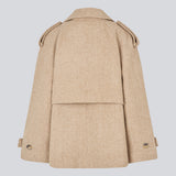 Double-breasted wool coat in a beige corlor with hidden buttons. EsmundMD jacket has classic coat details with raglan sleeves and a high yoke at the back.