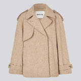 Double-breasted wool coat in a beige corlor with hidden buttons. EsmundMD jacket has classic coat details with raglan sleeves and a high yoke at the back.