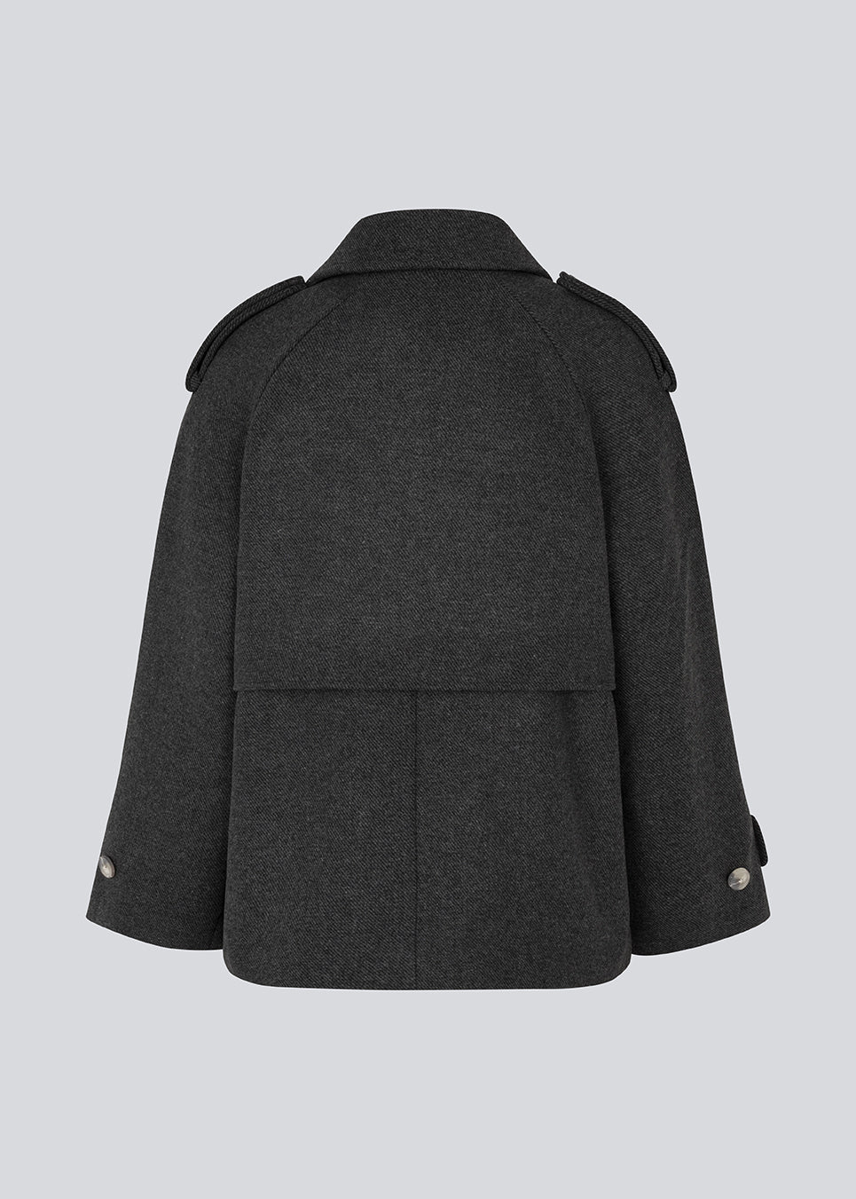 Double-breasted black wool coat with hidden buttons. EsmundMD jacket has classic coat details with raglan sleeves and a high yoke at the back.