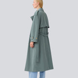 Oversized double-breasted trenchcoat with tie belt at the waist. EvieMD jacket has dropped shoulders and long, wide sleeves. Lined. 