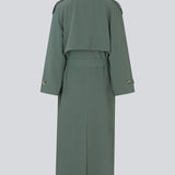 Oversized double-breasted trenchcoat with tie belt at the waist. EvieMD jacket has dropped shoulders and long, wide sleeves. Lined. 