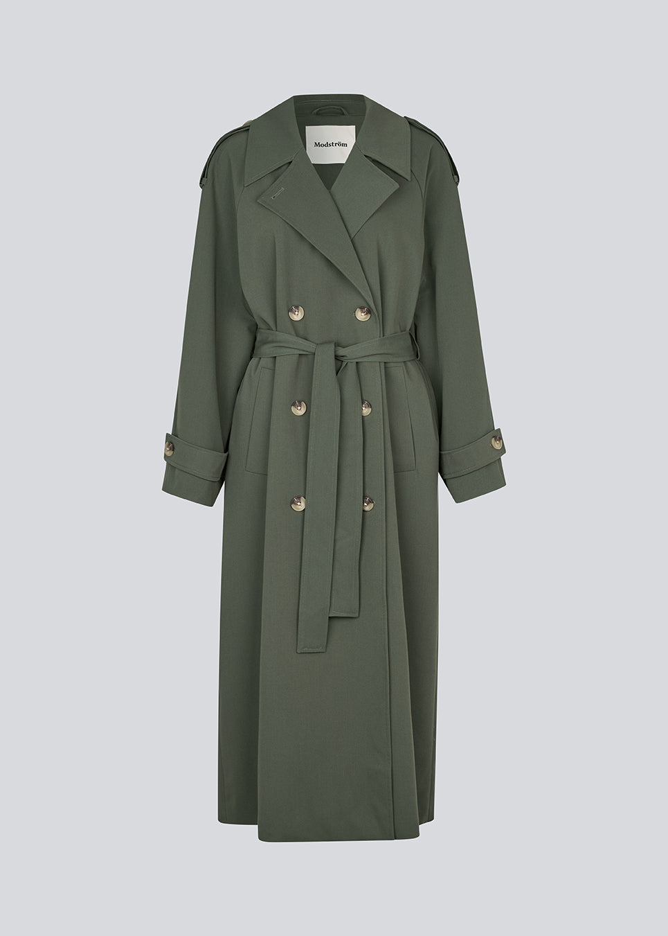 Oversized double-breasted trench coat in dark green with a tie belt at the waist. EvieMD jacket has dropped shoulders and long, wide sleeves. Lined.&nbsp;