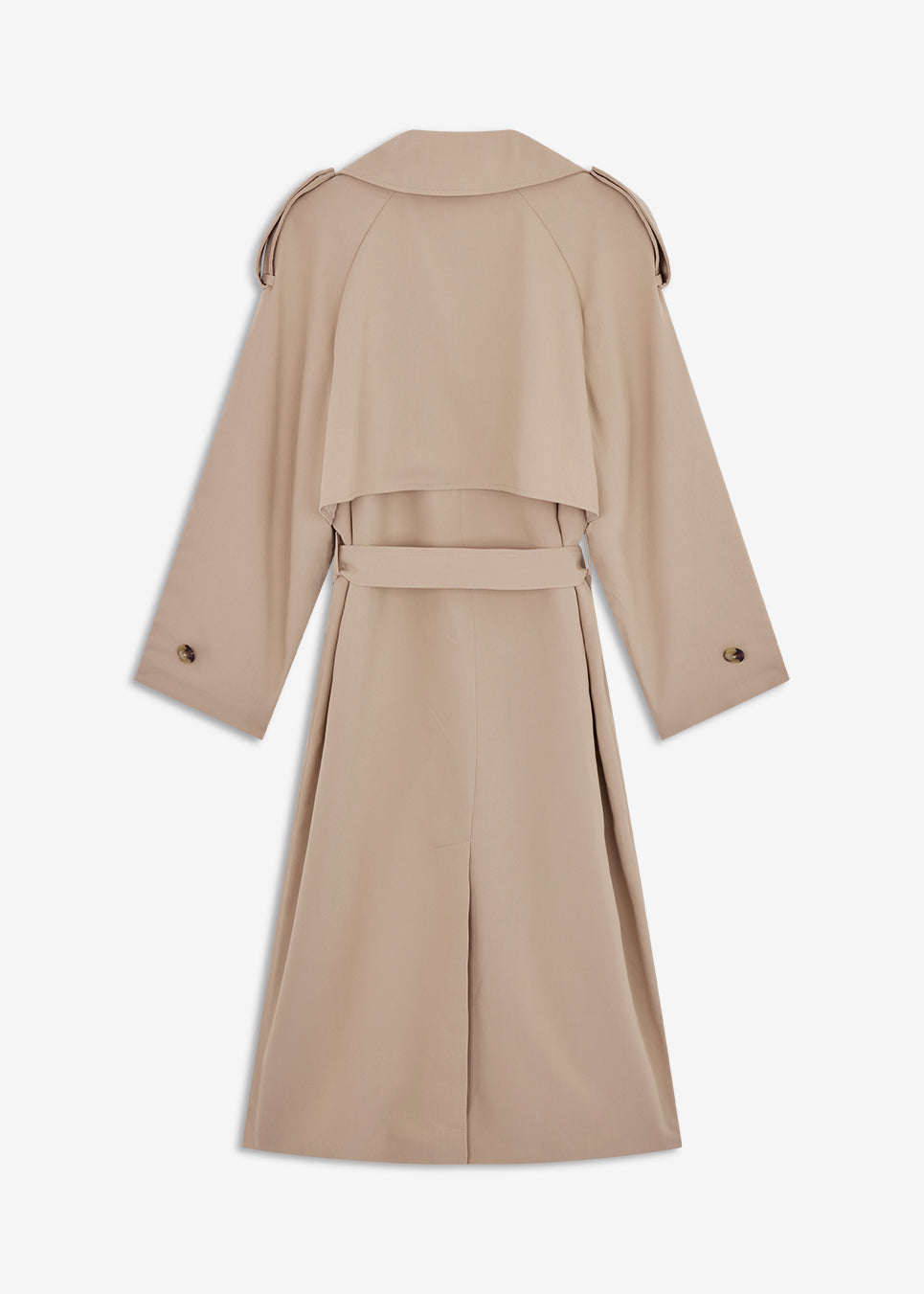 Oversized double-breasted trench coat in light beige with tie belt at the waist. EvieMD jacket has dropped shoulders and long, wide sleeves. Lined. The model is 175 cm and wears a size S/36.
