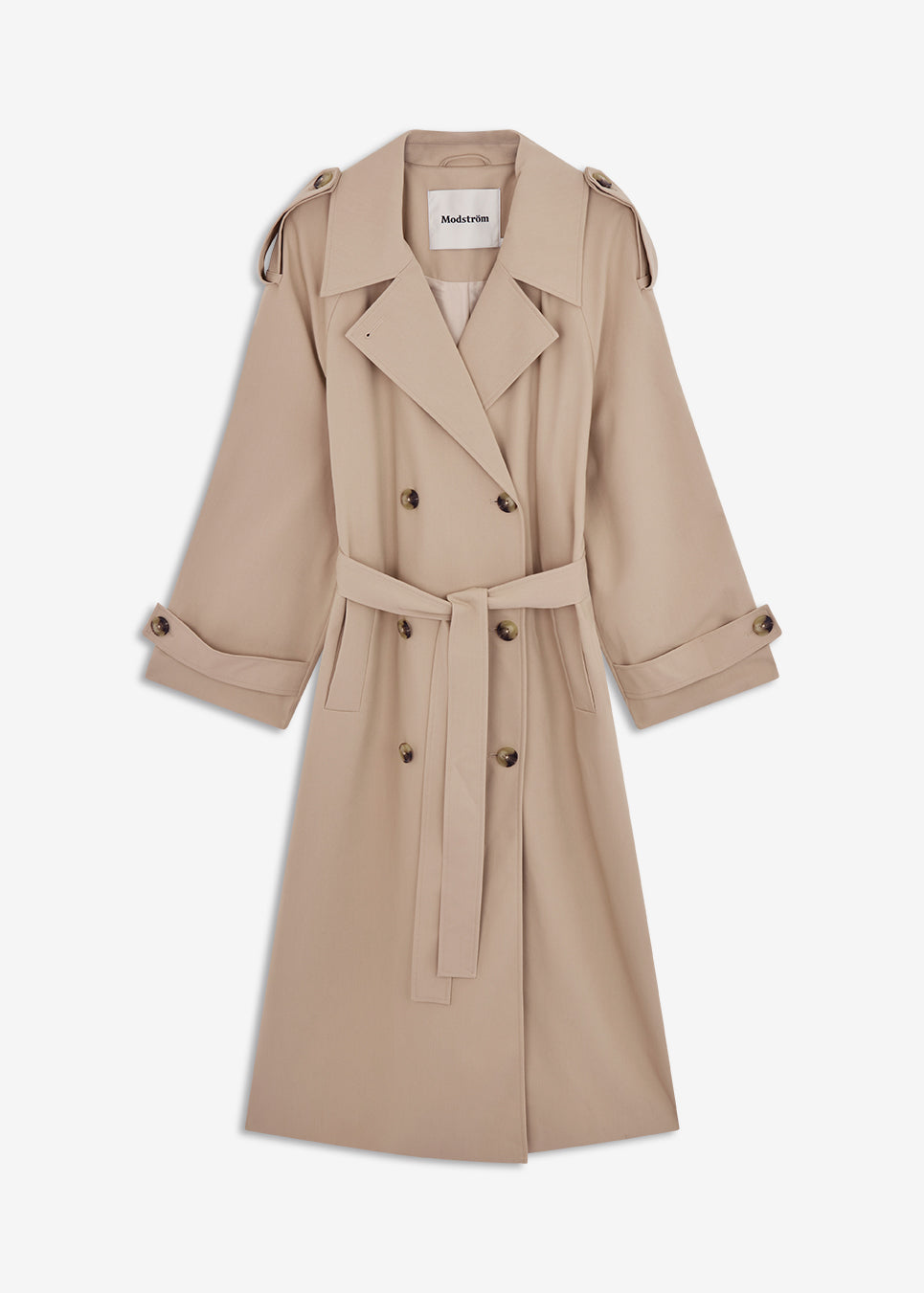 Oversized double-breasted trench coat in light beige with tie belt at the waist. EvieMD jacket has dropped shoulders and long, wide sleeves. Lined. The model is 175 cm and wears a size S/36.