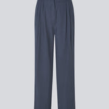 FanyaMD pants have a menswear-inspired look with straight, wide legs, a high waist with zip fly and button and elastication in back. Doubble pleat in front and side pockets