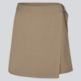 Short skirt in twill. FanyaMD skirt has a wrap detail and is closed with a belt buckle in the side.