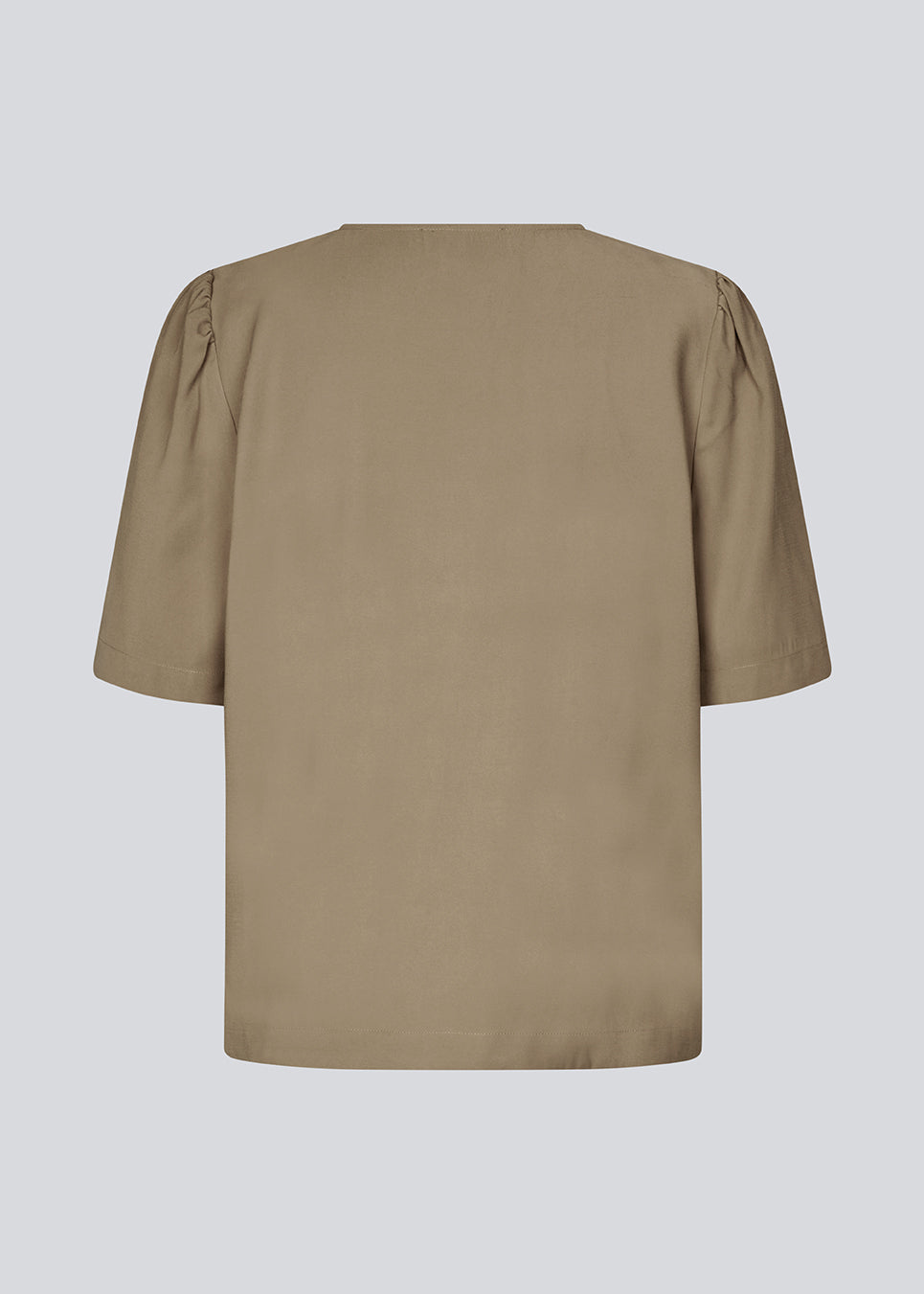 Top in light brown with short sleeves and a relaxed fit. FanyaMD SS top has an opening in front with a button closure.