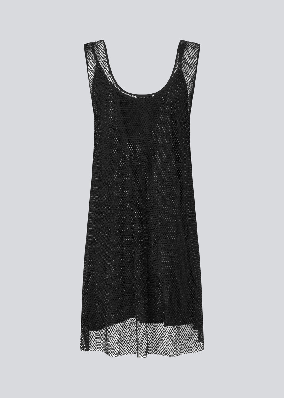 Short dress with a straight silhouette and wide straps. FazilMD dress has a see-through overlay with shiny pearls and a slip dress with a v-neckline. The model is 175 cm and wears a size S/36.