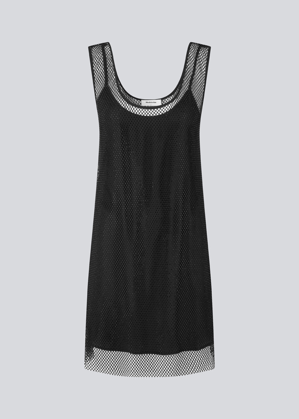 Short dress with a straight silhouette and wide straps. FazilMD dress has a see-through overlay with shiny pearls and a slip dress with a v-neckline. The model is 175 cm and wears a size S/36.