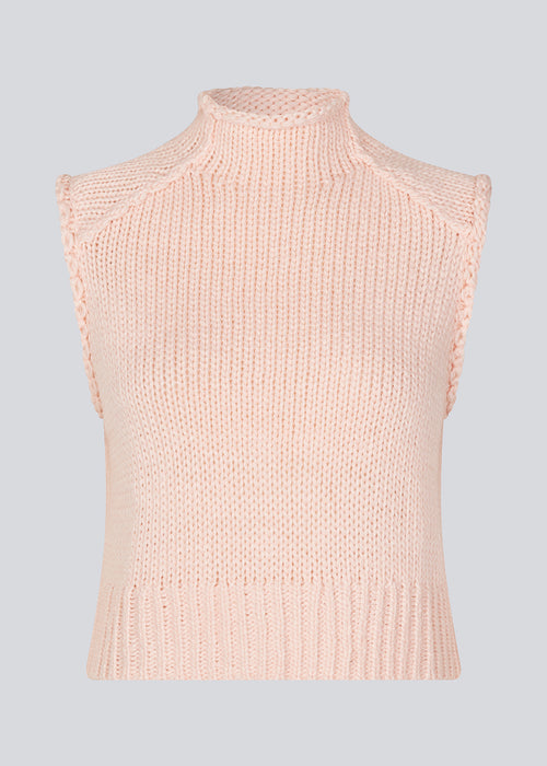 Loose sleeveless vest in plain jersey knit. FelipeMD vest has a pink pale color, is slightly cropped and has a high neck.