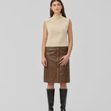 Loose off white sleeveless vest in plain jersey knit. FelipeMD vest is slightly cropped and has a high neck.