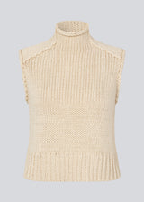 Loose off white sleeveless vest in plain jersey knit. FelipeMD vest is slightly cropped and has a high neck.