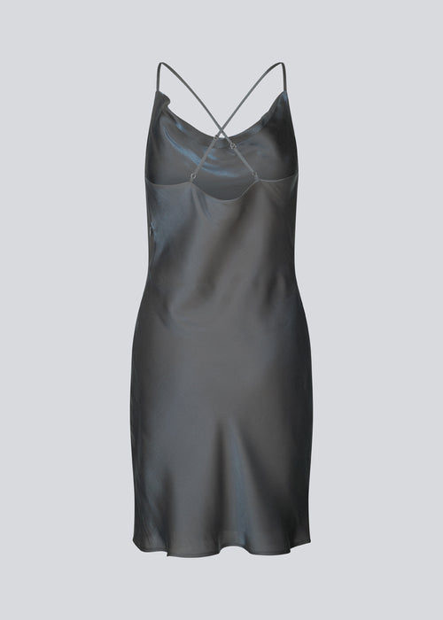 Mini dress in satin with a soft drape. FerronMD dress has a drapy neckline and narrow straps crossing at the back. Lined. The model is 175 cm and wears a size S/36.