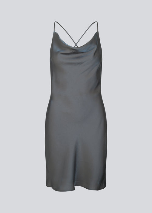 Mini dress in satin with a soft drape. FerronMD dress has a drapy neckline and narrow straps crossing at the back. Lined. The model is 175 cm and wears a size S/36.