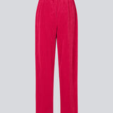 Pink corduroy pants with long, wide legs and a high waist with zip fly and button, and elastic on the back. FikaMD pants are lined. The model is 175 cm and wears a size S/36. side pockets. The model is 175 cm and wears a size S/36.