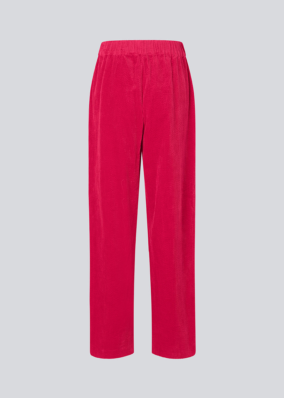 Pink corduroy pants with long, wide legs and a high waist with zip fly and button, and elastic on the back. FikaMD pants are lined. The model is 175 cm and wears a size S/36. side pockets. The model is 175 cm and wears a size S/36.