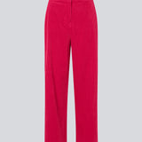Pink corduroy pants with long, wide legs and a high waist with zip fly and button, and elastic on the back. FikaMD pants are lined. The model is 175 cm and wears a size S/36. side pockets. The model is 175 cm and wears a size S/36.
