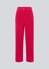 Pink corduroy pants with long, wide legs and a high waist with zip fly and button, and elastic on the back. FikaMD pants are lined. The model is 175 cm and wears a size S/36. side pockets. The model is 175 cm and wears a size S/36.