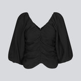 Long sleeved top in black in woven quality with long, voluminous sleeves. FisherMD top has a v-neckline in front and back with ruched seams, adding a drapy effect.