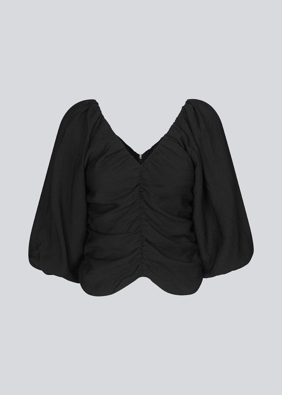 Long sleeved top in black in woven quality with long, voluminous sleeves. FisherMD top has a v-neckline in front and back with ruched seams, adding a drapy effect.