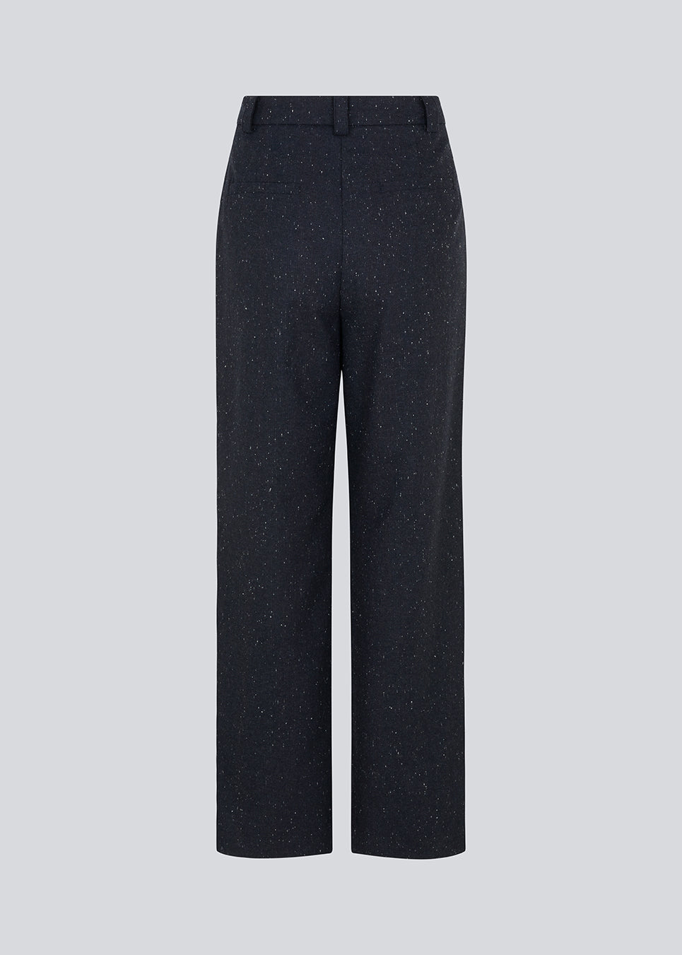 Long-tailored pants with wide legs and pleats in front. FolaMD pants are designed in a wool blend with tiny colored flecks. Part of a set, buy the matching blazer here: FolaMD blazer. The model is 175 cm and wears a size S/36.