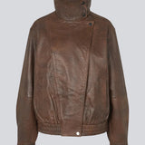 Forestmd jacket is designed in a relaxed silhouette with a high stand collar, concealed asymmetrical closure, and elasticated hem for a cool bomber-inspired look. The textured leather-look finish adds character, while the oversized fit makes it a versatile outerwear piece that effortlessly elevates both casual and dressed-up outfits.
