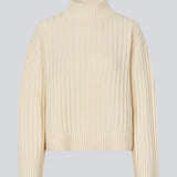Off white rib knitted jumper with a high neck and a relaxed fit. FultonMD rib t-neck has dropped shoulders and long wide sleeves.