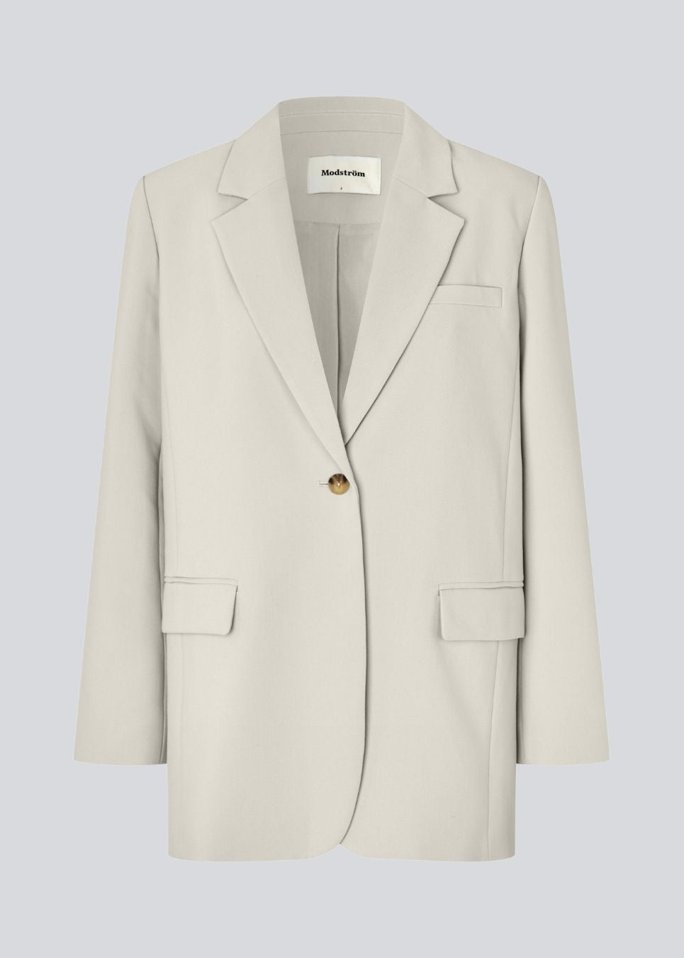 Gale blazer in beige has a classic and elegant design, fulfilled by the beautiful revers collar and a long fit. The blazer has button closure at the front and a chest pocket at the left side.

Material:
5% Elastane
76% Recycled Polyester
19% Viscose

Lining:
35% Polyester
65% Viscose