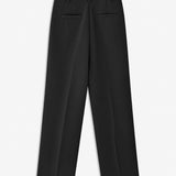 Gale pants in Black have a classic design. The pants have straight, wide legs with pressfolds, which creates an elegant look.