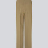 Gale pants in the color Dune have a classic design. The pants have straight, wide legs with press folds, which creates an elegant look. The model is 177 cm and wears a size S/36.  Style the pants with a matching blazer in the same color: Gale blazer.