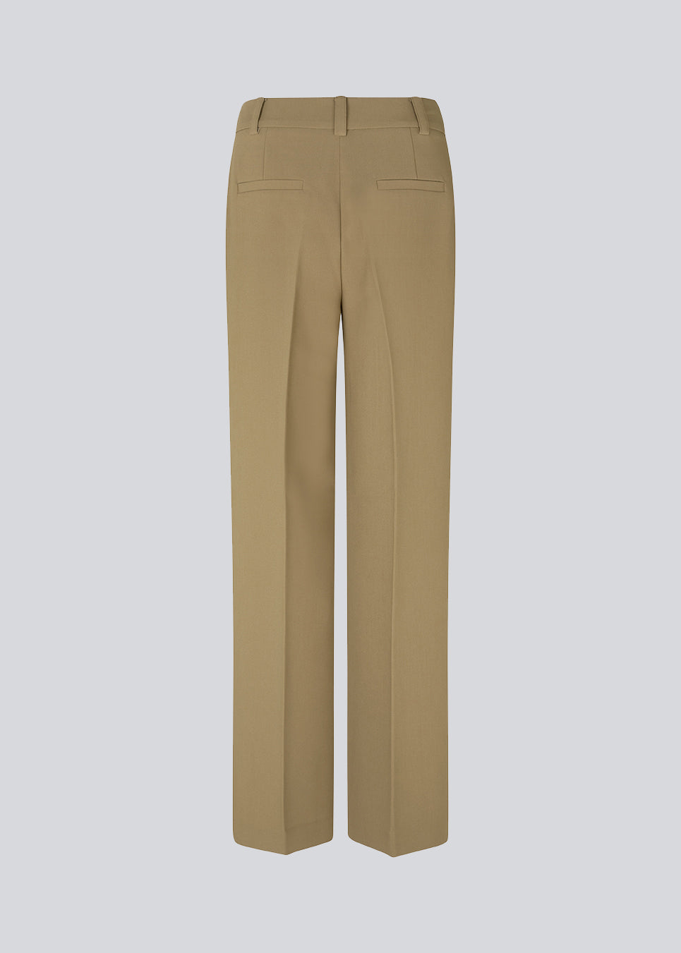 Gale pants in the color Dune have a classic design. The pants have straight, wide legs with press folds, which creates an elegant look. The model is 177 cm and wears a size S/36.  Style the pants with a matching blazer in the same color: Gale blazer.