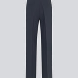 Gale pants in midnight blue have a classic design. The pants have straight, wide legs with press folds, which creates an elegant look. The model is 177 cm and wears a size S/36.  Style the pants with matching blazer in the same color: Gale blazer.