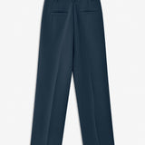 Gale pants in midnight blue have a classic design. The pants have straight, wide legs with press folds, which creates an elegant look.&nbsp;