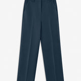 Gale pants in midnight blue have a classic design. The pants have straight, wide legs with press folds, which creates an elegant look.&nbsp;
