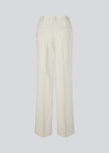 Gale pants in beige has a classic design. The pants has straight, wide legs with pressfolds, which creates an elegant look. The model is 175 cm and wears a size S/36.

Style the pants with matching vest: Galemd vest

Material:
5% Elastane
76% Recycled Polyester
19% Viscose

Lining:
35% Polyester
65% Viscose
