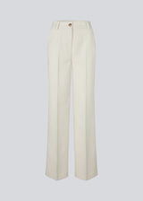 Gale pants in beige has a classic design. The pants has straight, wide legs with pressfolds, which creates an elegant look. The model is 175 cm and wears a size S/36.

Style the pants with matching vest: Galemd vest

Material:
5% Elastane
76% Recycled Polyester
19% Viscose

Lining:
35% Polyester
65% Viscose