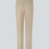 Gale pants in Powder Sand have a classic design. The pants have straight, wide legs with pressfolds, which creates an elegant look.