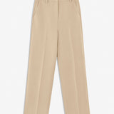 Gale pants in Powder Sand have a classic design. The pants have straight, wide legs with pressfolds, which creates an elegant look.