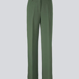 Gale pants in sea green have a classic design. The pants have straight, wide legs with press folds, which creates an elegant look. These pants have a spacious fit. We recommend sizing down.