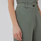Gale pants in soft green has a classic design. The pants has straight, wide legs with pressfolds, which creates an elegant look. The model is 175 cm and wears a size S/36.<br>